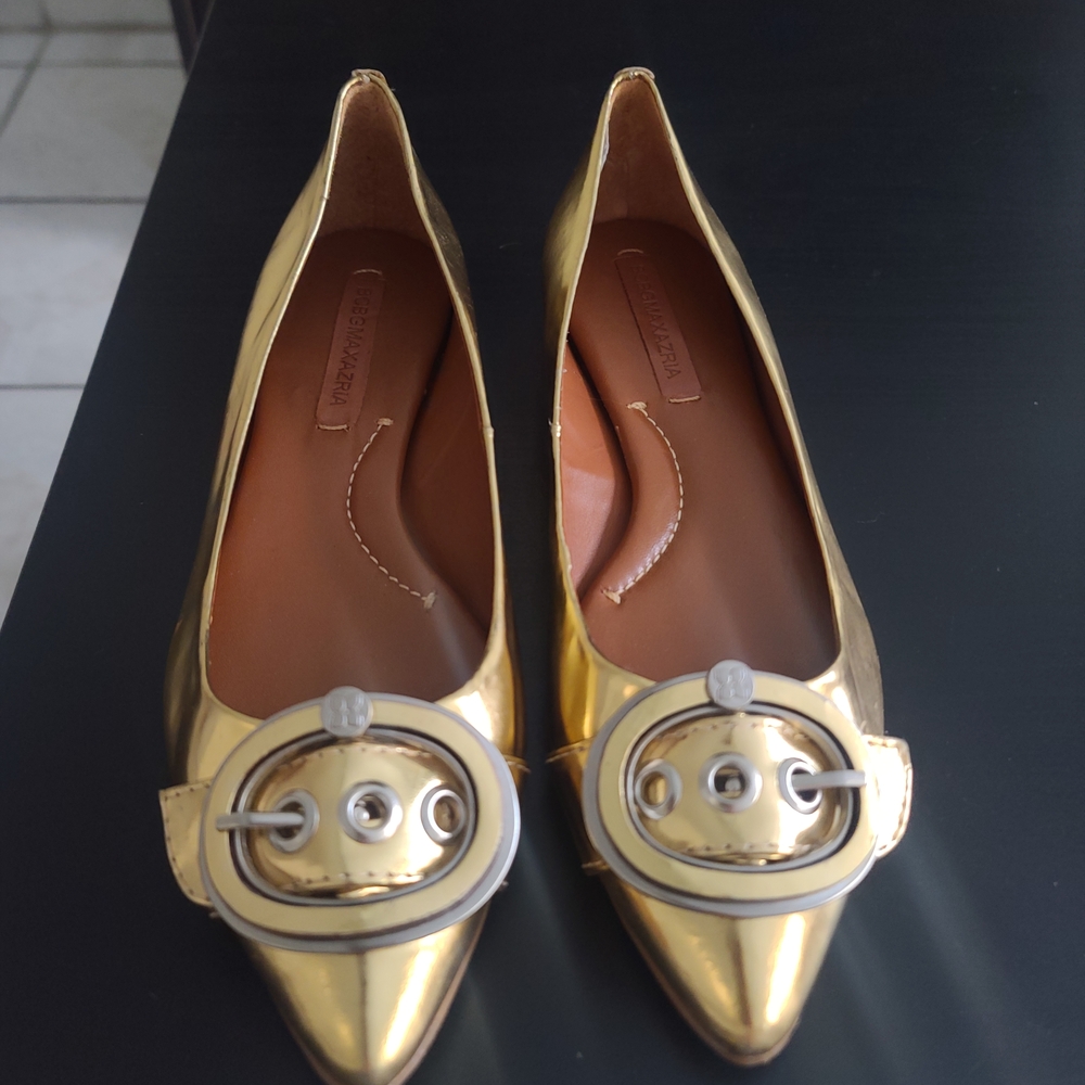BCBGMaxAzria Gold Flats with Buckle Accent